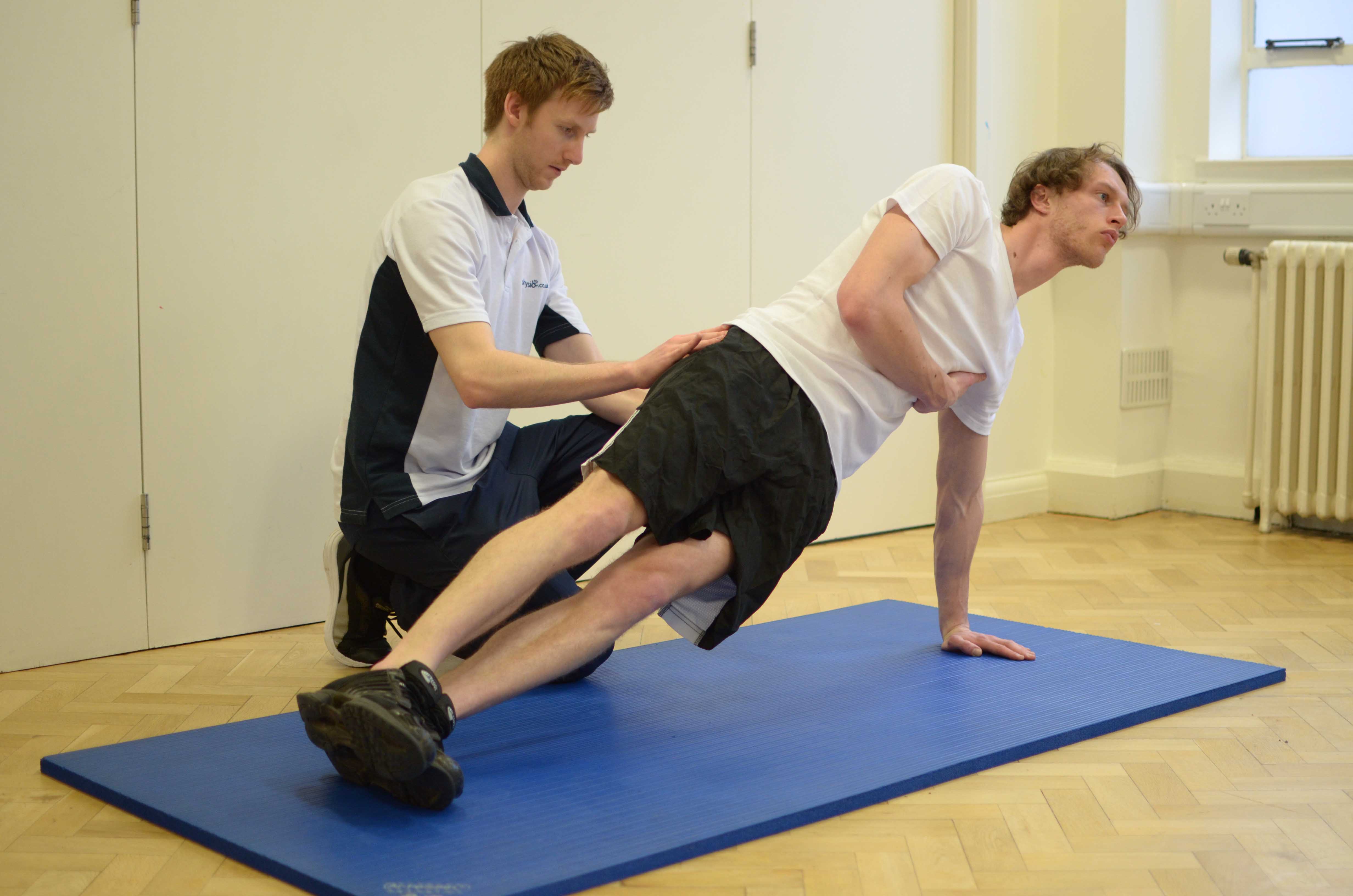 Progressive strengthening hip exercises supervised by experienced therapist